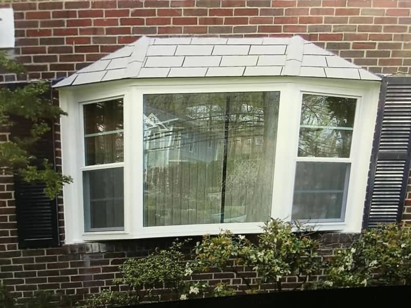 After-New bay window replacing double hung and picture window
