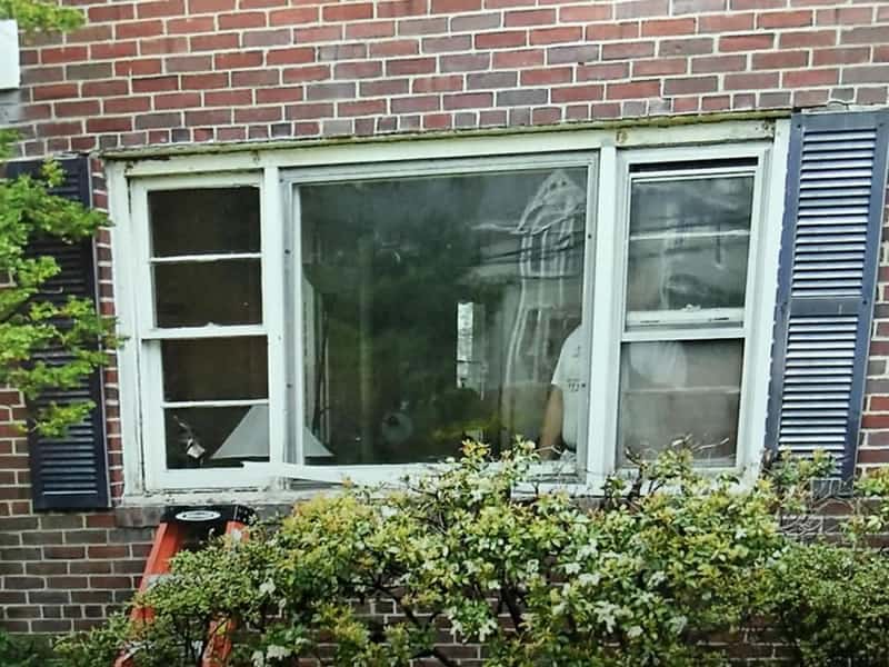 Before-New bay window replacing double hung and picture window
