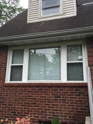 Before-Double hung / picture window replaced by beautiful bay window with casements