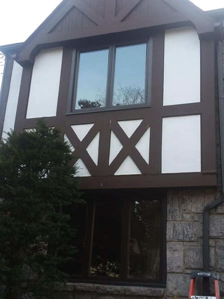 After-First and second floor crank windows replaced with energy efficient casement windows