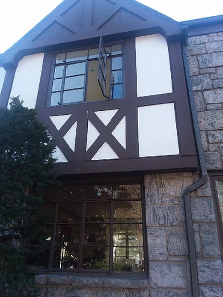 Before-First and second floor crank windows replaced with energy efficient casement windows